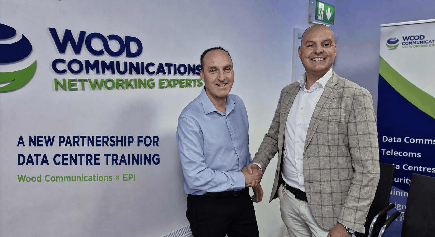 Derek Finlay and Dennis at the Wood Communications office in Dublin, marking the EPI training partnership